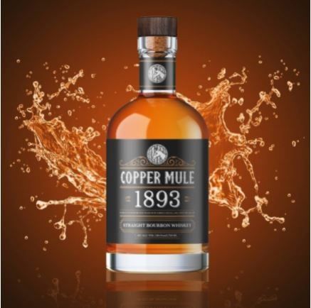 A bottle of Copper Mule Straight Bourbon Whiskey with a caramel-colored background and a splash of whiskey.