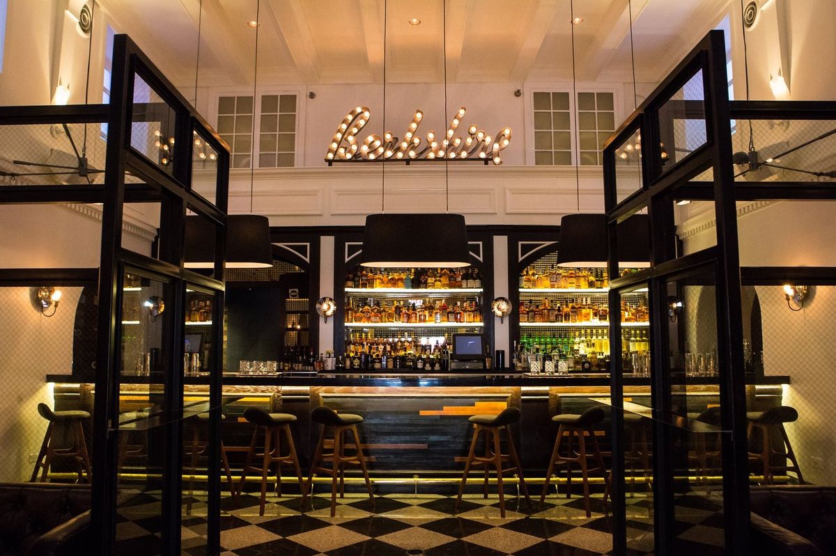 Whiskey bar panned out with stools lining in front of the counter, and Berkshire’s words hung above.